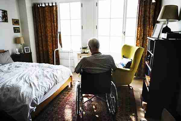 personal-injury-law-firm-elderly-man-in-wheel-chair-alone-in-room